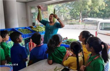 Grade 2 students visit Golden Harvest and vegetable vendor